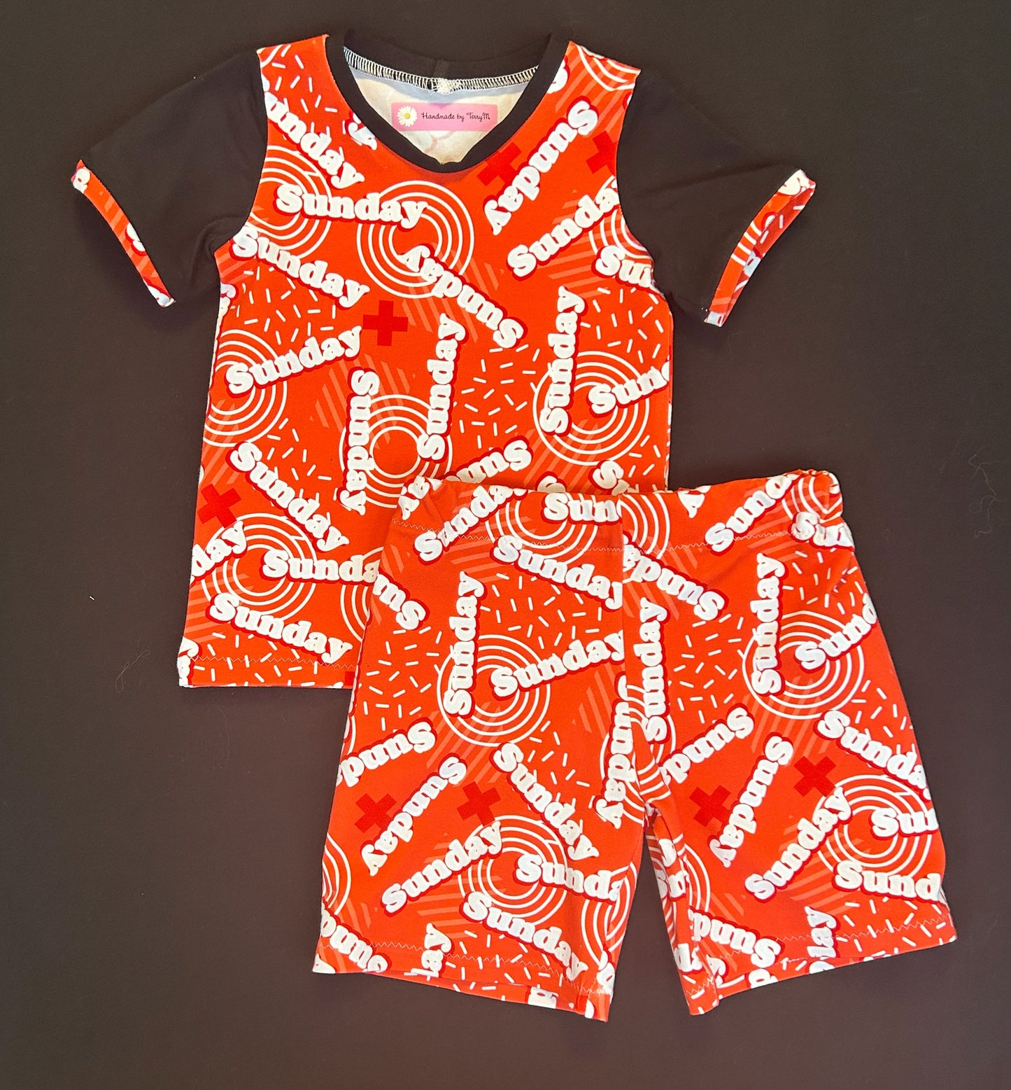“Red and black kids outfit – size 2”
“Handmade Sunday T shirt and shorts set”