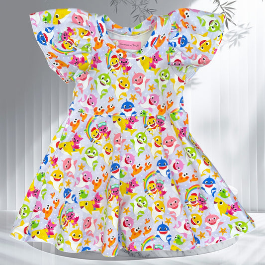 Lilac baby shark dress – size 1
Handmade colourful undersea skater dress
