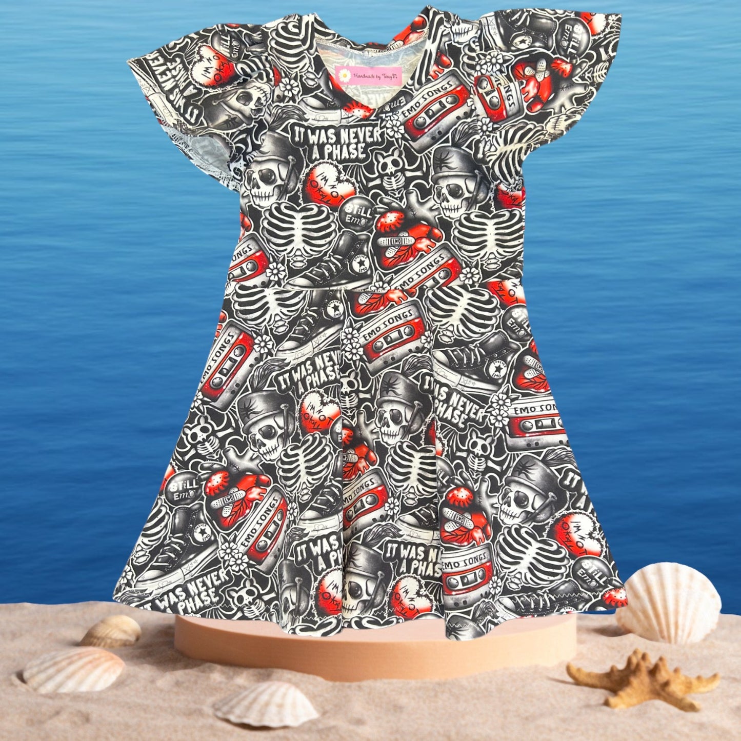 “Black emo print girls dress – size 3”
“Handmade quirky skater dress for kids”