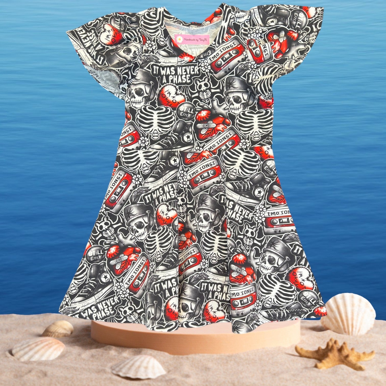 “Black emo print girls dress – size 3”
“Handmade quirky skater dress for kids”