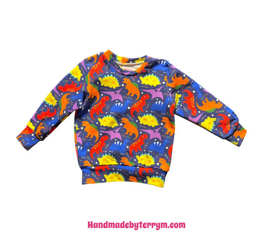 (1679) Colourful Dinosaur Jumper - Size 2