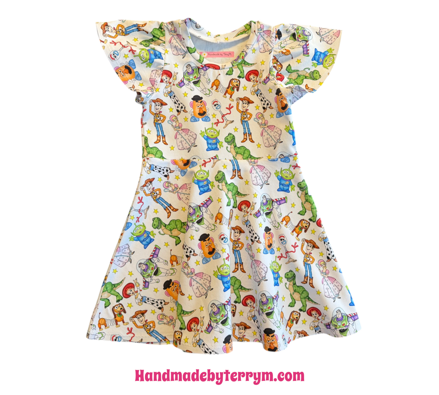 Andy’s toys girls dress size 3 white”
“Handmade toy character toddler dress”
