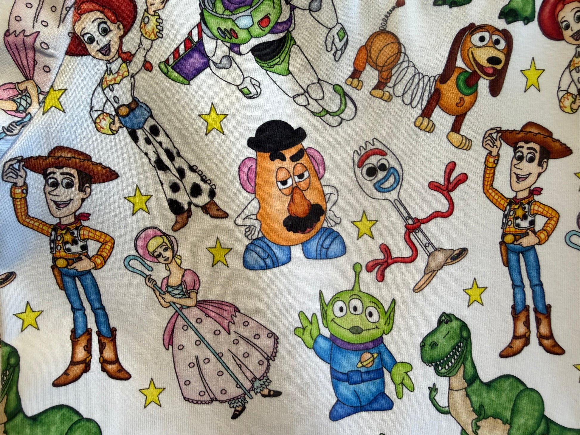 Andy’s toys girls dress size 3 white”
“Handmade toy character toddler dress”
