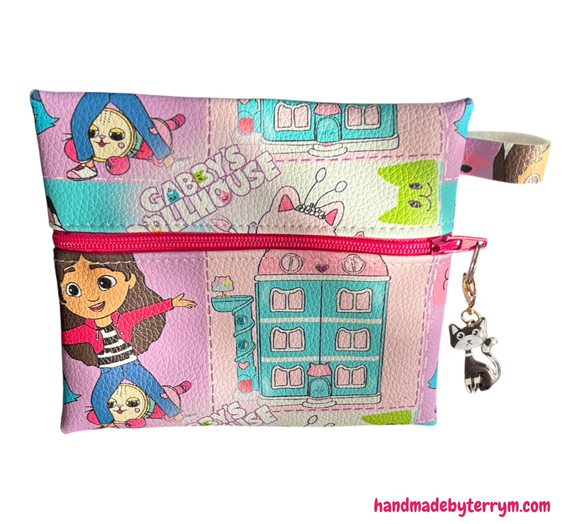 Colorful patchwork pouch with character design (Gabby) and pink zipper, featuring a cat keychain.