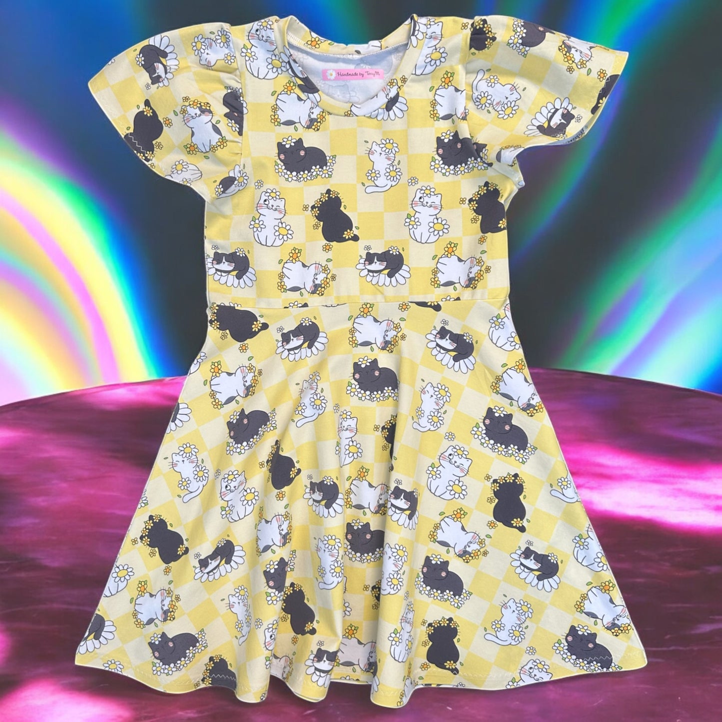 “Yellow cat and daisy girls dress – size 6”
“Handmade cute floral skater dress”
