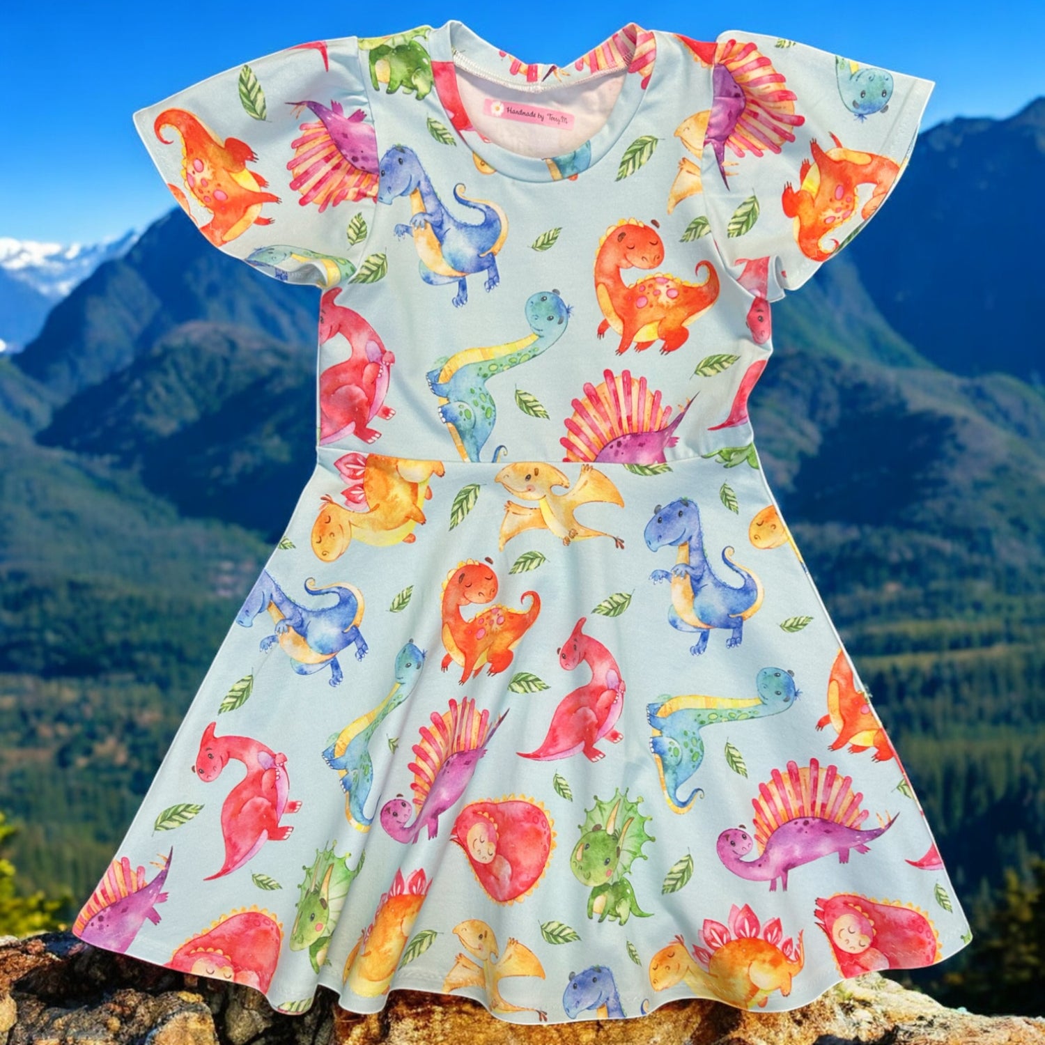 “Blue dinosaur girls dress – size 6”
“Handmade dino skater dress for kids”
