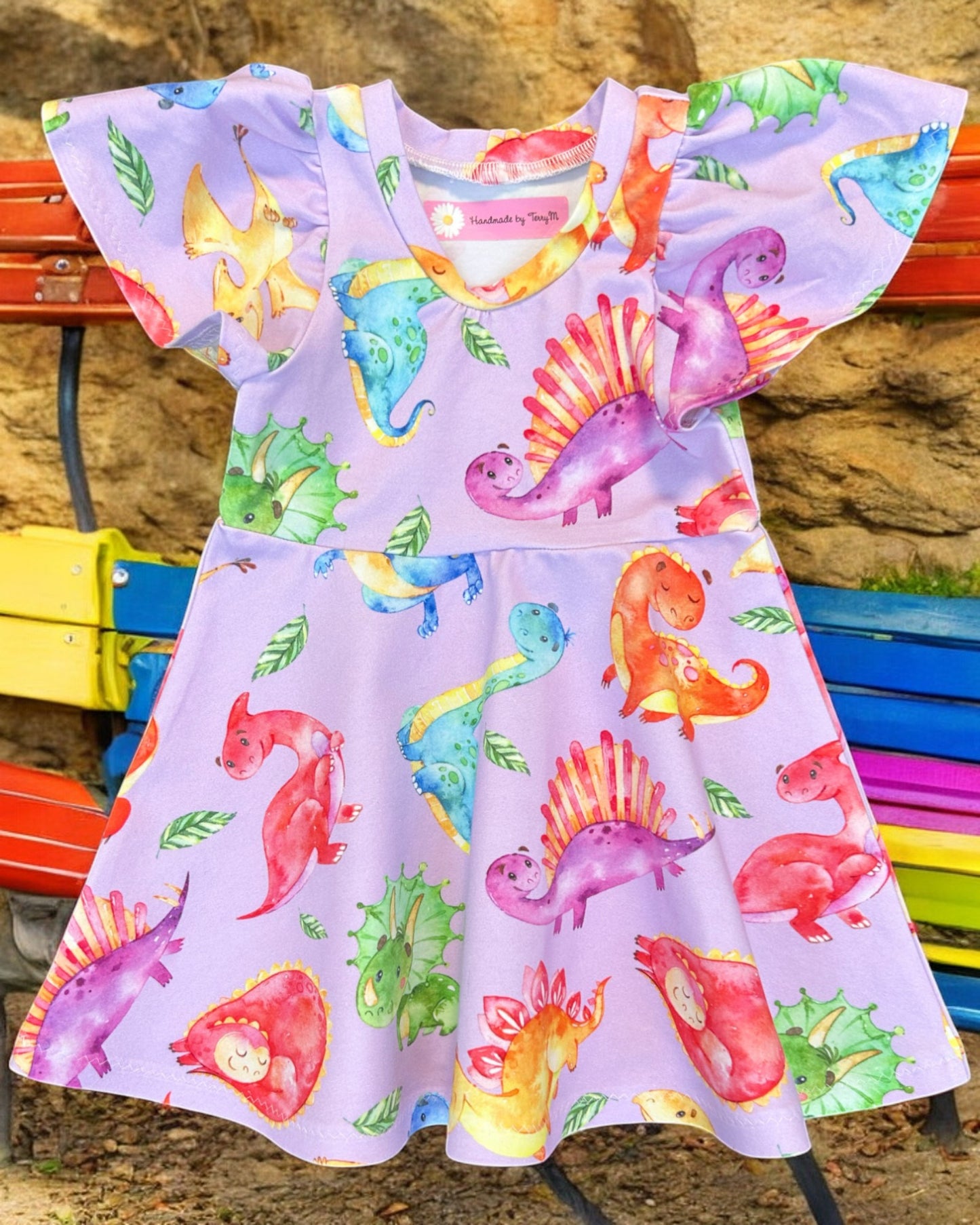 Lilac dinosaur baby dress – size 1
Handmade colourful dino skater dress
