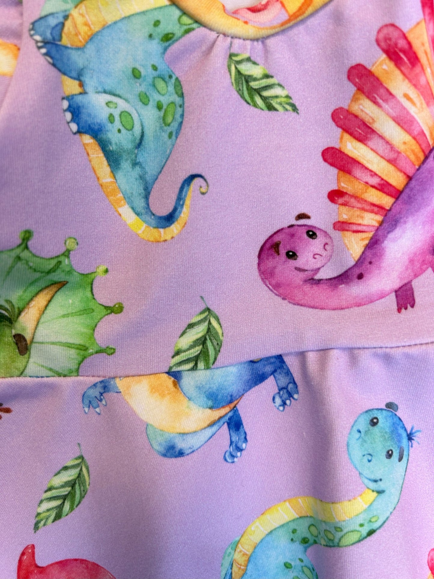 Lilac dinosaur baby dress – size 1
Handmade colourful dino skater dress
