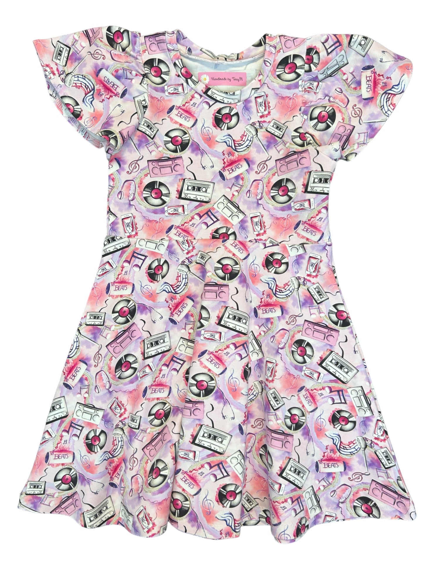 “Music print girls dress – size 5”
“Handmade musical skater dress”