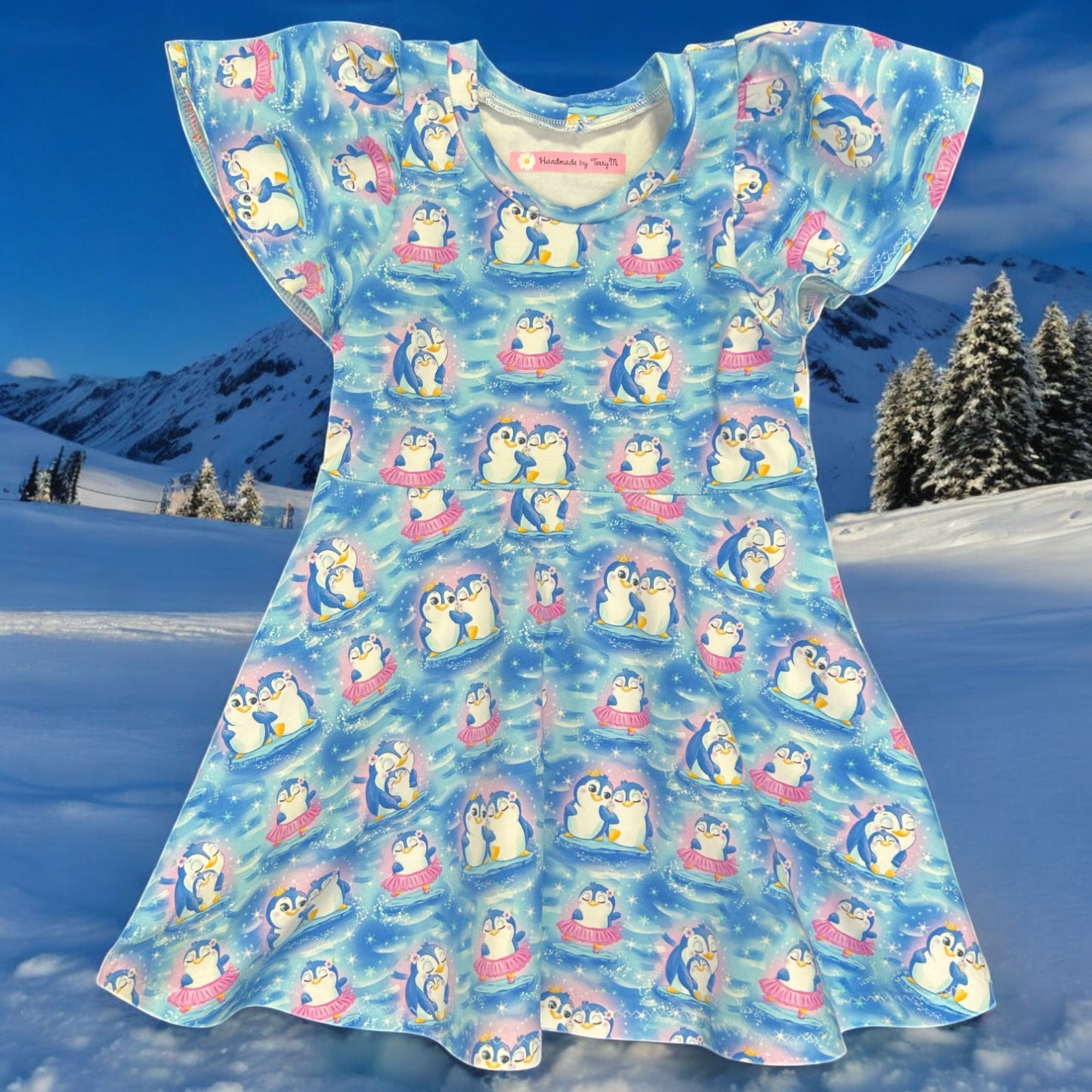 Penguin girls dress – size 2
Handmade blue penguin skater dress
