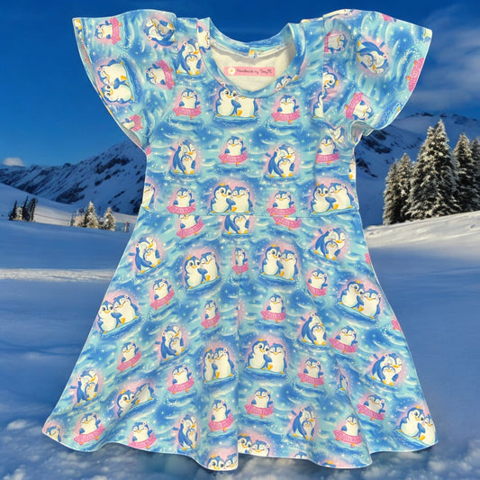 Penguin girls dress – size 2
Handmade blue penguin skater dress
