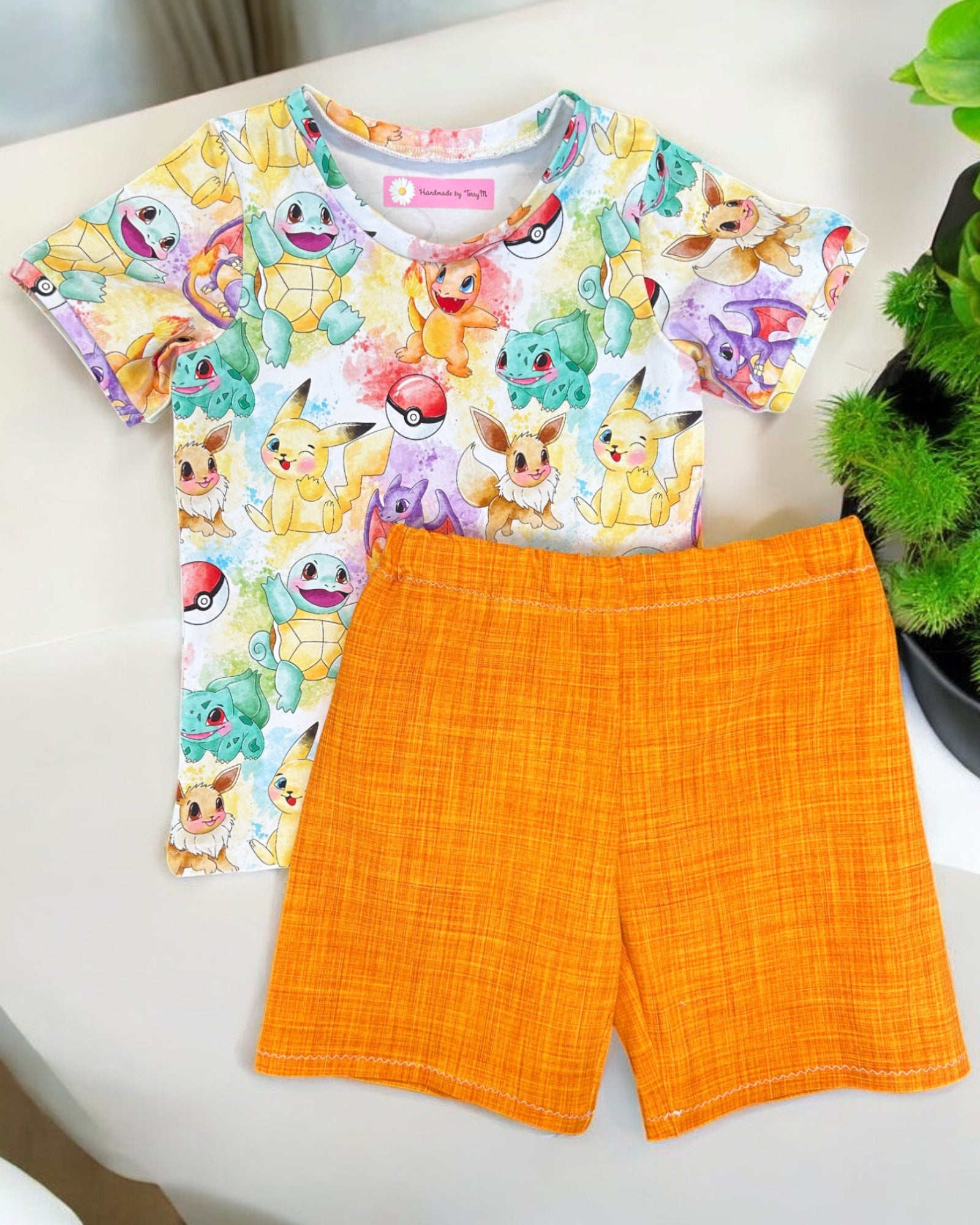 Poke character kids outfit – size 4
Handmade colourful T shirt and shorts set
