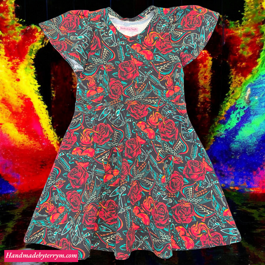 Rose and swallow girls dress – size 5”
“Handmade vintage skater dress”
