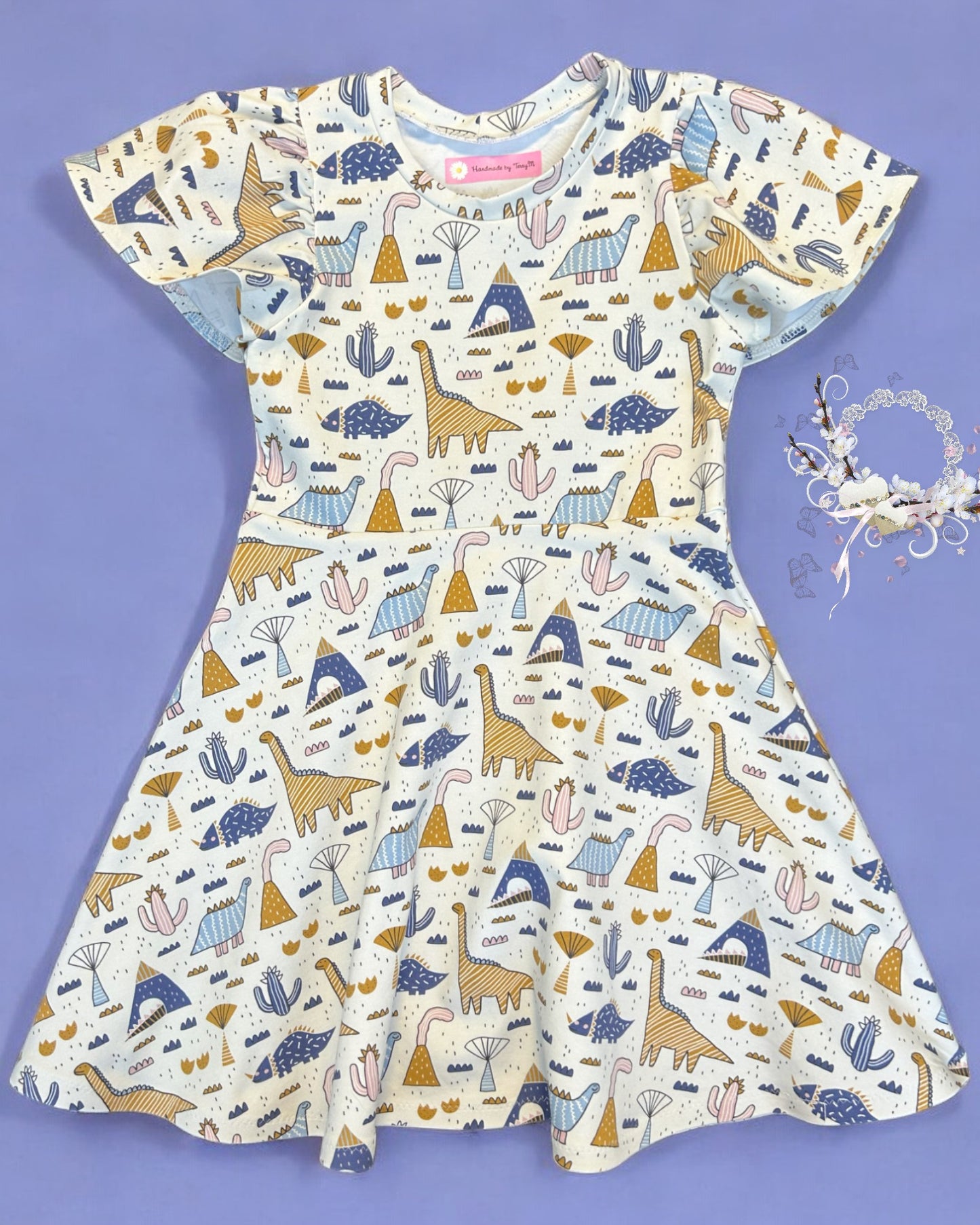 Scandi dinosaur girls dress – size 6”
“Handmade blue dino skater dress”
