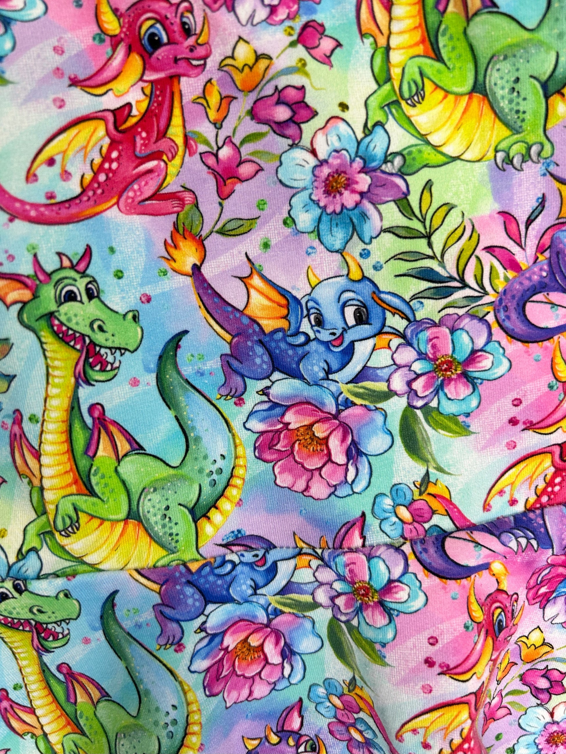 Rainbow dragon girls dress – size 2
Handmade colourful dragon skater dress
