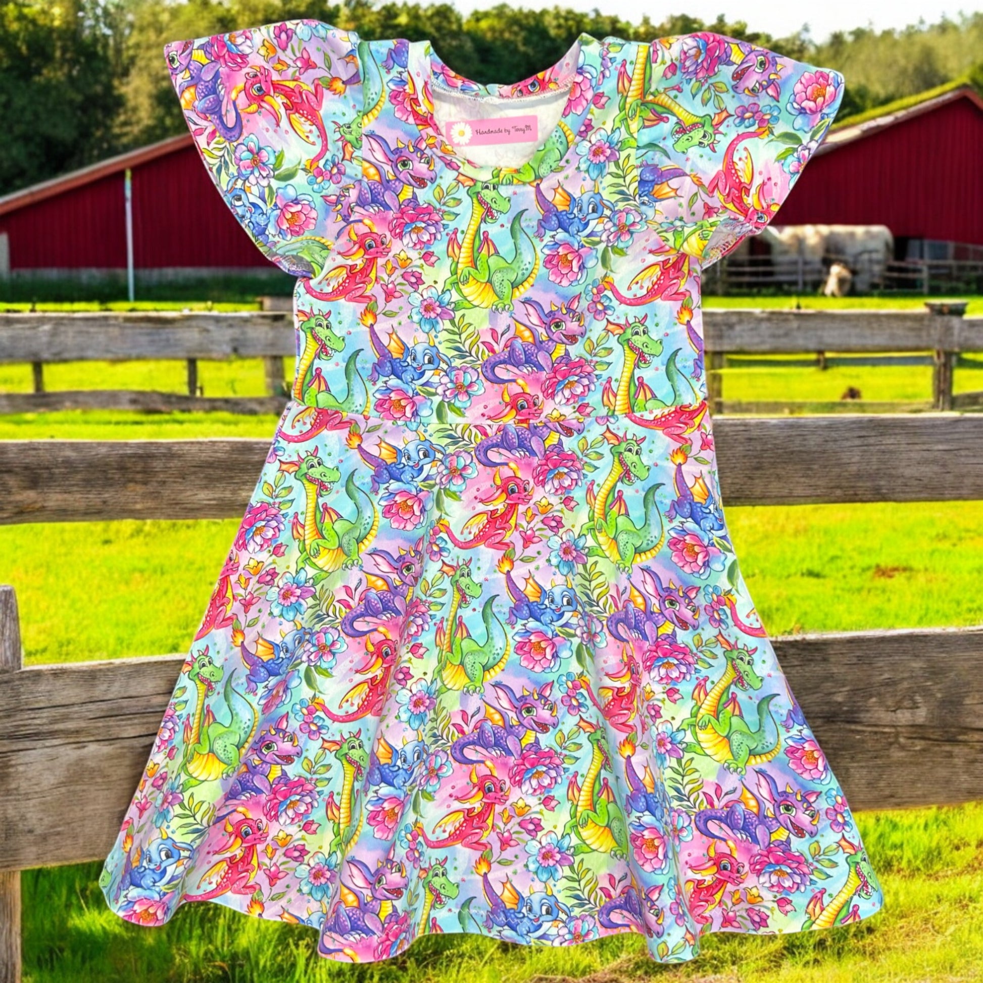 Colourful dragon girls dress – size 4
Handmade rainbow dragon skater dress
