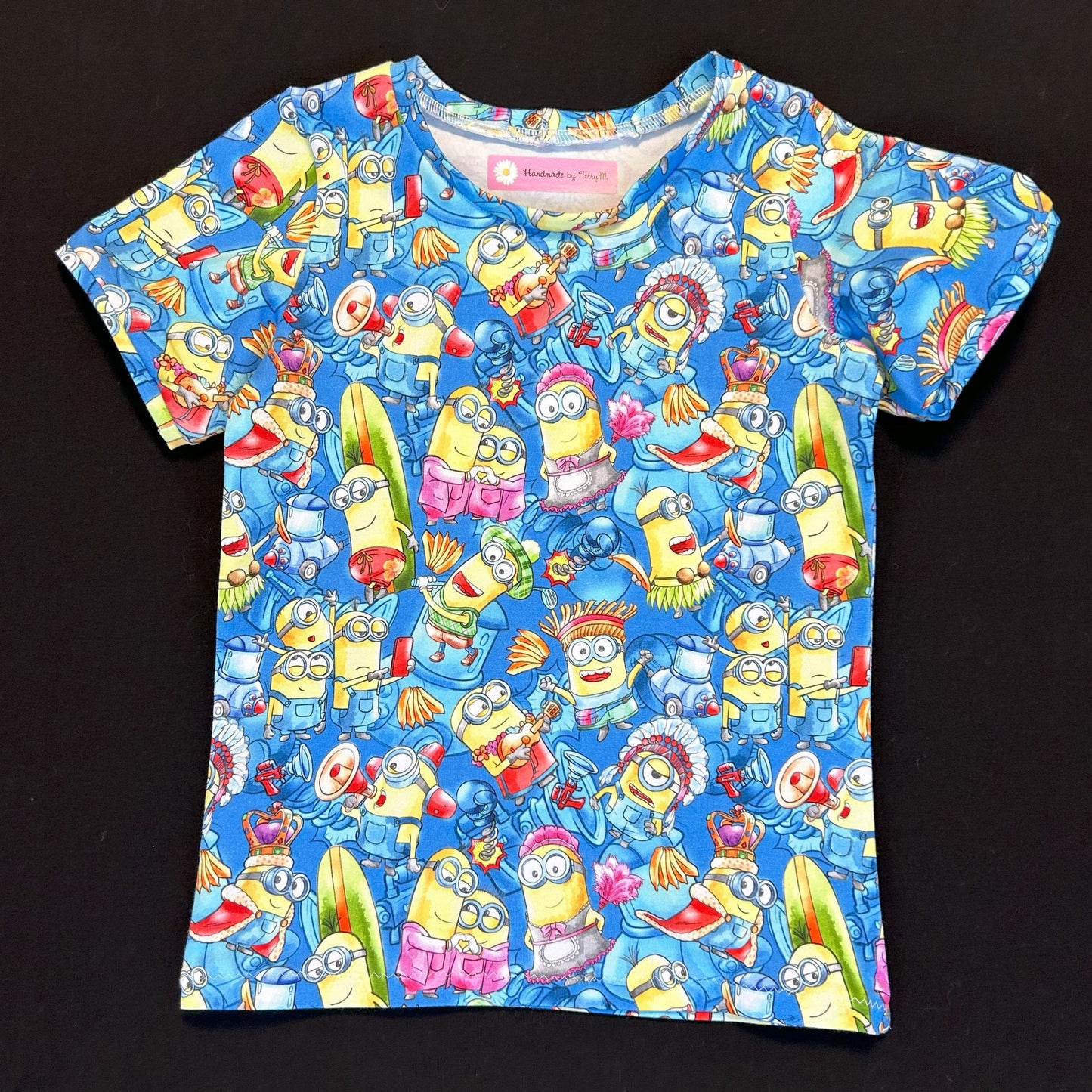 Yellow character kids outfit – size 4
Handmade cartoon T shirt and shorts set